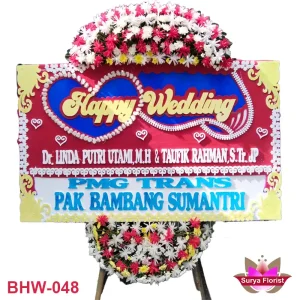 Contoh Karangan Bunga Papan Happy Wedding tersedia di Petukangan dan Pesanggrahan